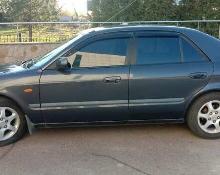 Синий Мазда 626, объемом двигателя 2 л и пробегом 260 тыс. км за 3000 $, фото 6 на Automoto.ua