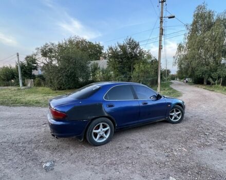 Синий Мазда 626, объемом двигателя 2 л и пробегом 230 тыс. км за 1250 $, фото 2 на Automoto.ua