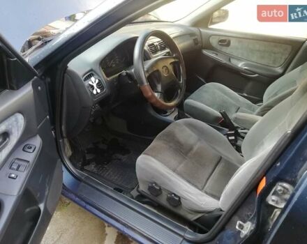 Синій Мазда 626, об'ємом двигуна 1.8 л та пробігом 389 тис. км за 2700 $, фото 10 на Automoto.ua