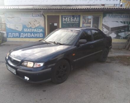 Синий Мазда 626, объемом двигателя 2 л и пробегом 480 тыс. км за 1650 $, фото 1 на Automoto.ua