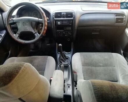 Синій Мазда 626, об'ємом двигуна 1.8 л та пробігом 389 тис. км за 2700 $, фото 14 на Automoto.ua