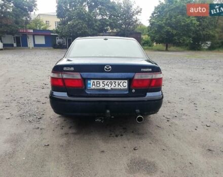 Синій Мазда 626, об'ємом двигуна 1.8 л та пробігом 389 тис. км за 2700 $, фото 7 на Automoto.ua