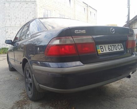 Синий Мазда 626, объемом двигателя 2 л и пробегом 480 тыс. км за 1650 $, фото 4 на Automoto.ua