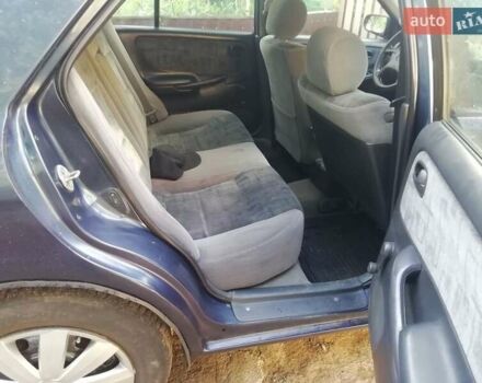 Синій Мазда 626, об'ємом двигуна 1.8 л та пробігом 389 тис. км за 2700 $, фото 12 на Automoto.ua