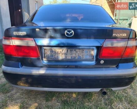Синий Мазда 626, объемом двигателя 2 л и пробегом 475 тыс. км за 2500 $, фото 4 на Automoto.ua
