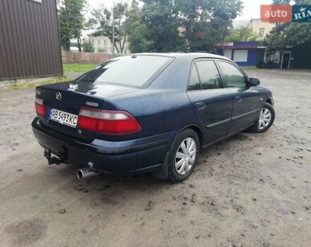 Синій Мазда 626, об'ємом двигуна 1.8 л та пробігом 389 тис. км за 2700 $, фото 5 на Automoto.ua