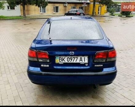 Синій Мазда 626, об'ємом двигуна 2 л та пробігом 320 тис. км за 3200 $, фото 1 на Automoto.ua
