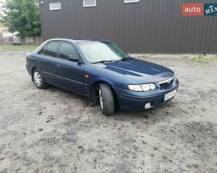 Синій Мазда 626, об'ємом двигуна 1.8 л та пробігом 389 тис. км за 2700 $, фото 2 на Automoto.ua