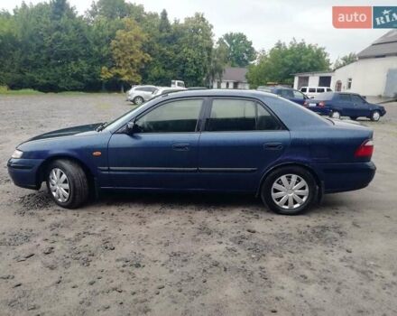 Синій Мазда 626, об'ємом двигуна 1.8 л та пробігом 389 тис. км за 2700 $, фото 4 на Automoto.ua