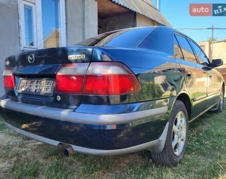 Синий Мазда 626, объемом двигателя 2 л и пробегом 475 тыс. км за 2500 $, фото 2 на Automoto.ua