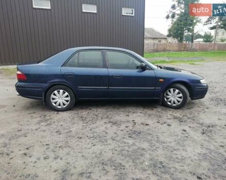 Синій Мазда 626, об'ємом двигуна 1.8 л та пробігом 389 тис. км за 2700 $, фото 3 на Automoto.ua