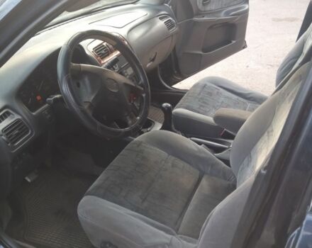 Синий Мазда 626, объемом двигателя 2 л и пробегом 480 тыс. км за 1650 $, фото 5 на Automoto.ua