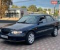 Синий Мазда 626, объемом двигателя 2 л и пробегом 300 тыс. км за 2090 $, фото 1 на Automoto.ua