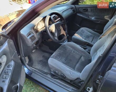Синий Мазда 626, объемом двигателя 2 л и пробегом 475 тыс. км за 2500 $, фото 6 на Automoto.ua