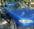 Синий Мазда 626, объемом двигателя 1.7 л и пробегом 326 тыс. км за 1900 $, фото 1 на Automoto.ua