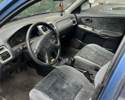 Синій Мазда 626, об'ємом двигуна 2 л та пробігом 300 тис. км за 600 $, фото 5 на Automoto.ua