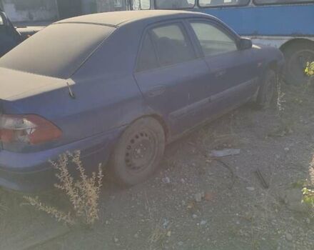 Синий Мазда 626, объемом двигателя 2 л и пробегом 725 тыс. км за 213 $, фото 2 на Automoto.ua