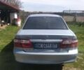 Синий Мазда 626, объемом двигателя 1.8 л и пробегом 260 тыс. км за 2500 $, фото 1 на Automoto.ua