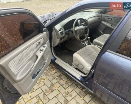 Синий Мазда 626, объемом двигателя 1.8 л и пробегом 395 тыс. км за 1500 $, фото 4 на Automoto.ua