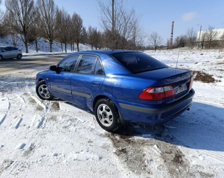 Синій Мазда 626, об'ємом двигуна 2 л та пробігом 285 тис. км за 3199 $, фото 4 на Automoto.ua