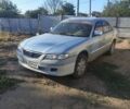 Синий Мазда 626, объемом двигателя 2 л и пробегом 400 тыс. км за 669 $, фото 2 на Automoto.ua