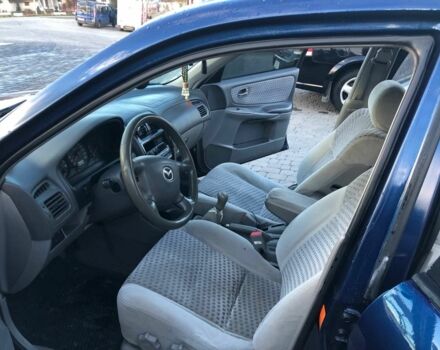 Синий Мазда 626, объемом двигателя 2 л и пробегом 260 тыс. км за 2800 $, фото 2 на Automoto.ua