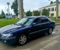 Синий Мазда 626, объемом двигателя 2 л и пробегом 248 тыс. км за 2100 $, фото 1 на Automoto.ua