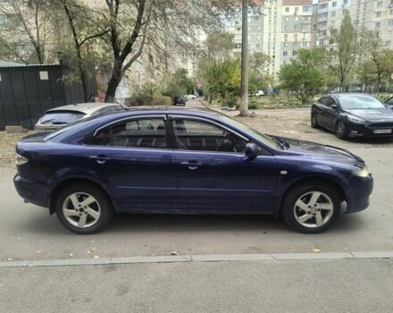 Синий Мазда 626, объемом двигателя 2 л и пробегом 289 тыс. км за 2450 $, фото 7 на Automoto.ua