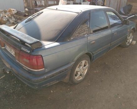 Синий Мазда 626, объемом двигателя 2 л и пробегом 800 тыс. км за 1100 $, фото 1 на Automoto.ua