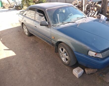 Синий Мазда 626, объемом двигателя 2 л и пробегом 800 тыс. км за 1100 $, фото 2 на Automoto.ua