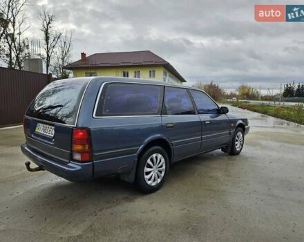 Синий Мазда 626, объемом двигателя 2 л и пробегом 502 тыс. км за 1100 $, фото 1 на Automoto.ua