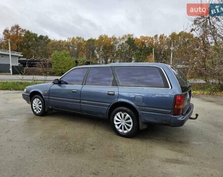 Синий Мазда 626, объемом двигателя 2 л и пробегом 502 тыс. км за 1100 $, фото 2 на Automoto.ua