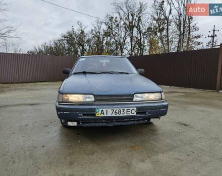 Синий Мазда 626, объемом двигателя 2 л и пробегом 502 тыс. км за 1100 $, фото 4 на Automoto.ua