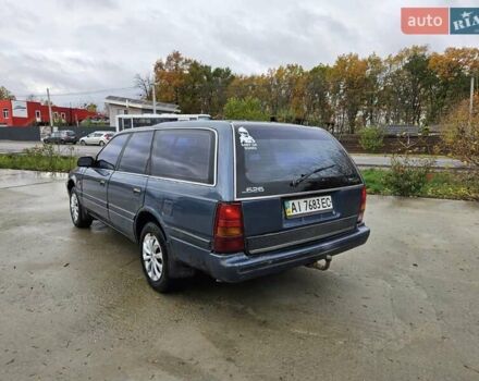 Синий Мазда 626, объемом двигателя 2 л и пробегом 502 тыс. км за 1100 $, фото 16 на Automoto.ua