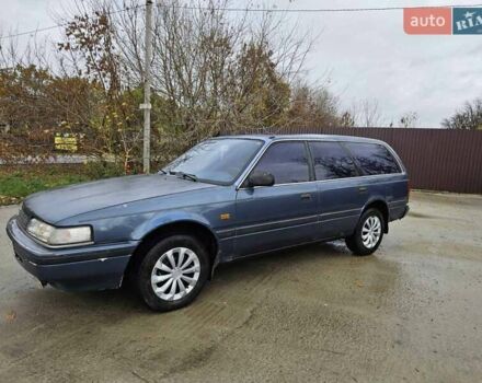 Синий Мазда 626, объемом двигателя 2 л и пробегом 502 тыс. км за 1100 $, фото 5 на Automoto.ua