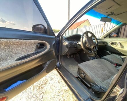 Синий Мазда 626, объемом двигателя 1.8 л и пробегом 287 тыс. км за 1300 $, фото 11 на Automoto.ua