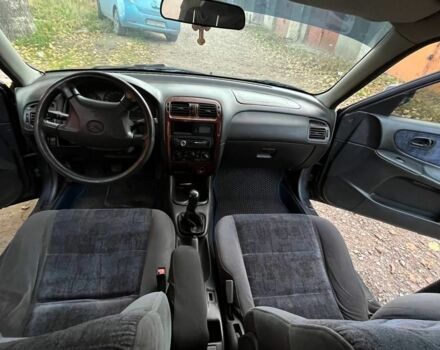 Синій Мазда 626, об'ємом двигуна 1.8 л та пробігом 320 тис. км за 3200 $, фото 7 на Automoto.ua