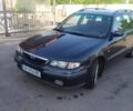 Синій Мазда 626, об'ємом двигуна 2 л та пробігом 429 тис. км за 2000 $, фото 1 на Automoto.ua