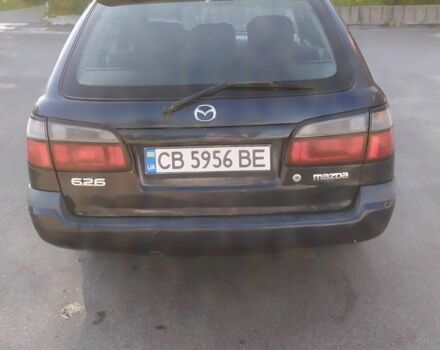 Синій Мазда 626, об'ємом двигуна 2 л та пробігом 429 тис. км за 2000 $, фото 6 на Automoto.ua