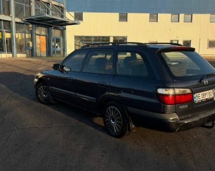 Синій Мазда 626, об'ємом двигуна 1.8 л та пробігом 320 тис. км за 3200 $, фото 12 на Automoto.ua