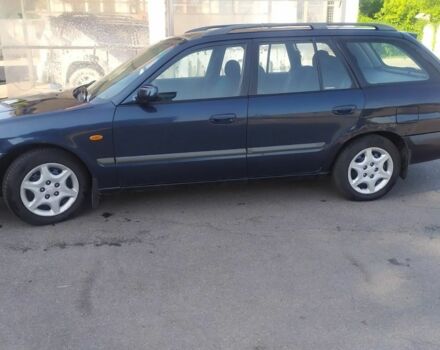 Синій Мазда 626, об'ємом двигуна 2 л та пробігом 429 тис. км за 2000 $, фото 2 на Automoto.ua