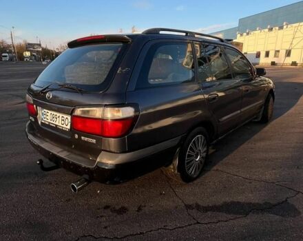 Синій Мазда 626, об'ємом двигуна 1.8 л та пробігом 320 тис. км за 3200 $, фото 14 на Automoto.ua