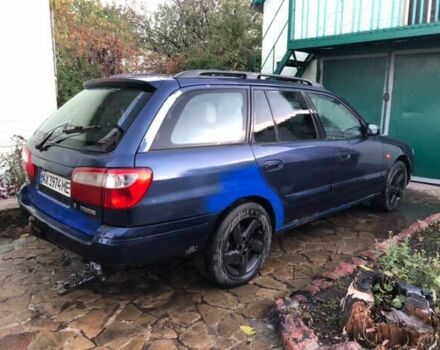 Синій Мазда 626, об'ємом двигуна 2 л та пробігом 5 тис. км за 1074 $, фото 1 на Automoto.ua