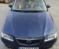 Синій Мазда 626, об'ємом двигуна 2 л та пробігом 248 тис. км за 2510 $, фото 1 на Automoto.ua