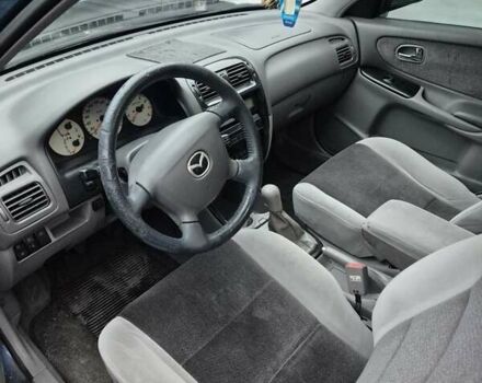 Синій Мазда 626, об'ємом двигуна 2 л та пробігом 245 тис. км за 2500 $, фото 19 на Automoto.ua