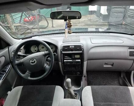 Синій Мазда 626, об'ємом двигуна 2 л та пробігом 245 тис. км за 2500 $, фото 12 на Automoto.ua