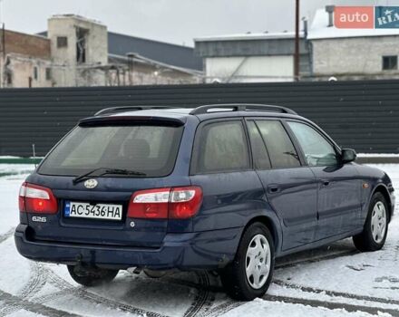 Синій Мазда 626, об'ємом двигуна 2 л та пробігом 294 тис. км за 1999 $, фото 3 на Automoto.ua