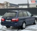 Синій Мазда 626, об'ємом двигуна 2 л та пробігом 294 тис. км за 1999 $, фото 3 на Automoto.ua