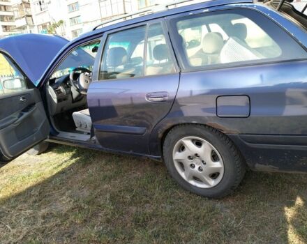 Синий Мазда 626, объемом двигателя 2 л и пробегом 285 тыс. км за 1900 $, фото 4 на Automoto.ua