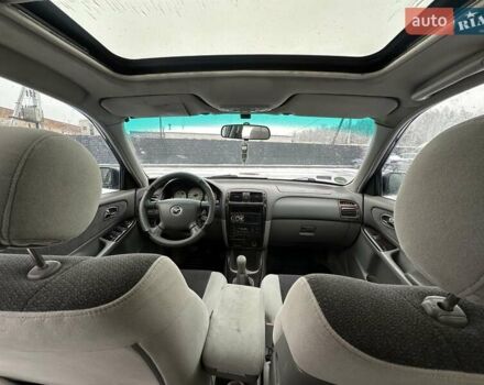 Синій Мазда 626, об'ємом двигуна 2 л та пробігом 294 тис. км за 1999 $, фото 8 на Automoto.ua